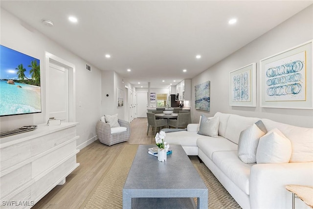 261 S Collier Blvd Unit 304, Marco Island, FL 34145 - living room featuring recessed lighting, light wood finished floors, baseboards, and visible vents