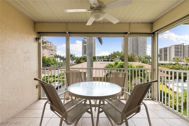 261 S Collier Blvd Unit 304, Marco Island, FL 34145 - sunroom / solarium featuring a ceiling fan