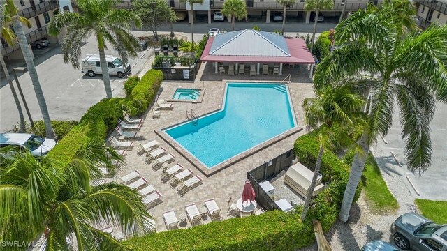 community pool featuring a patio area