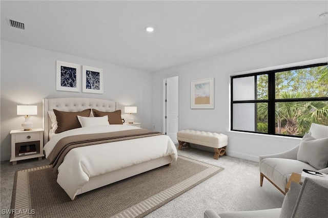 carpeted bedroom with baseboards and recessed lighting