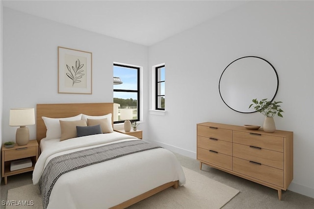 bedroom with baseboards and light colored carpet