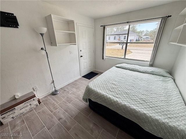 314 Vermont Way, Lehigh Acres, FL 33936 - bedroom featuring wood finished floors and baseboards