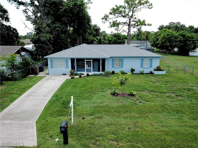314 Vermont Way, Lehigh Acres, FL 33936 - ranch-style home with concrete driveway and roof with shingles