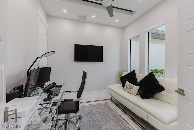 office space featuring a ceiling fan, baseboards, visible vents, and recessed lighting