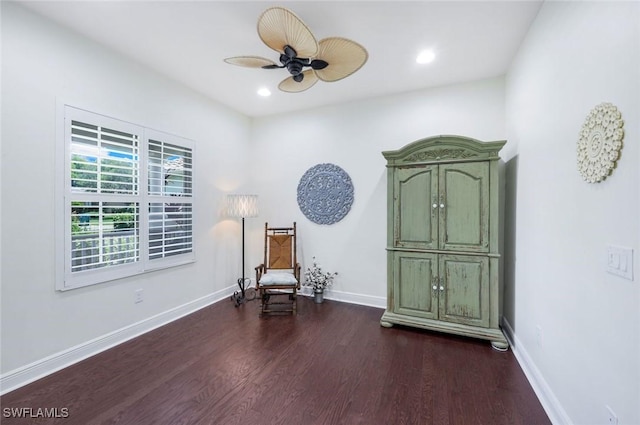 sitting room featuring dark wood finished floors, baseboards, ceiling fan, and recessed lighting