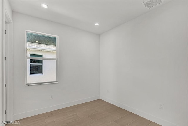44332 Panther Dr, Punta Gorda, FL 33982 - unfurnished room with baseboards and recessed lighting