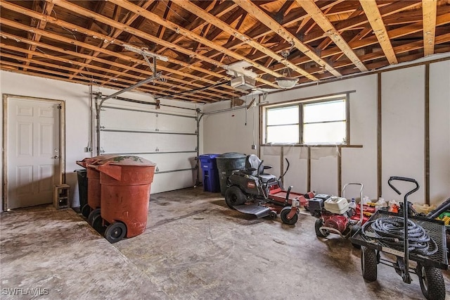 3965 W Riverside Dr, Fort Myers, FL 33901 - garage featuring a garage door opener