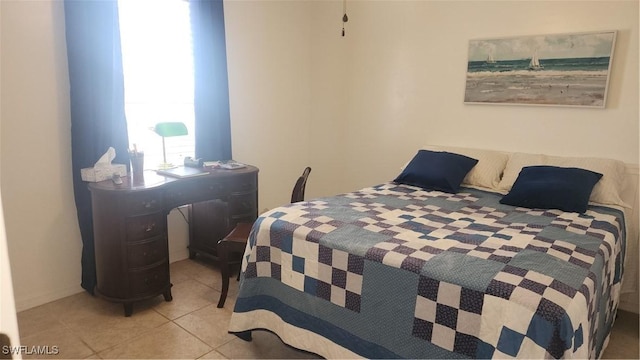 bedroom featuring tile patterned flooring