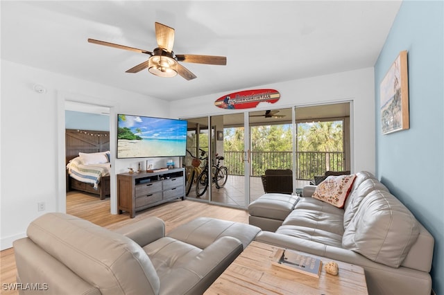 200 Stevens Landing Dr Unit B-103, Marco Island, FL 34145 - living room with ceiling fan and wood finished floors