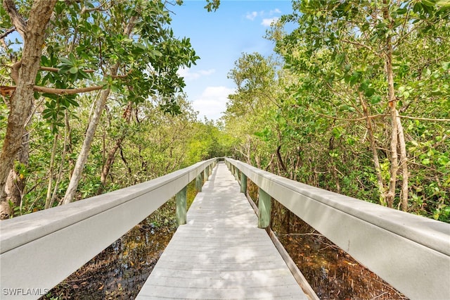 200 Stevens Landing Dr Unit B-103, Marco Island, FL 34145 - view of property's community with a forest view
