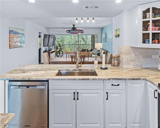 200 Stevens Landing Dr Unit B-103, Marco Island, FL 34145 - kitchen featuring dishwasher, ceiling fan, a sink, light stone countertops, and recessed lighting
