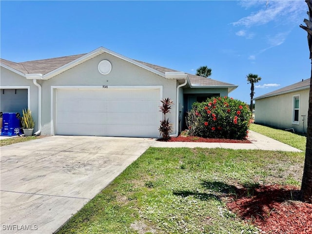 single story home with a garage, stucco siding, and driveway
