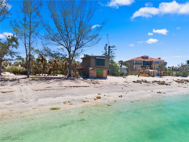 3203 Casey Key Rd, Nokomis, FL 34275 - view of yard with a water view and a view of the beach