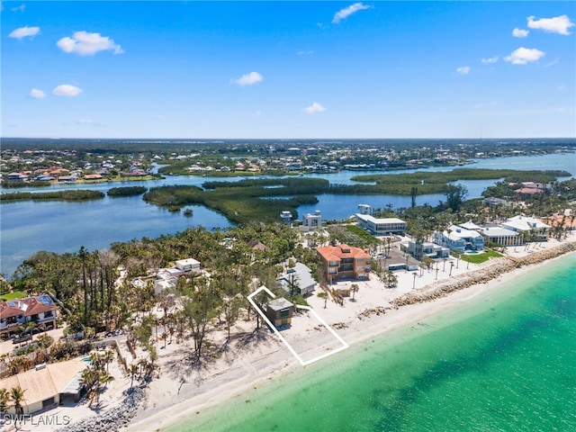 3203 Casey Key Rd, Nokomis, FL 34275 - drone / aerial view featuring a water view and a beach view