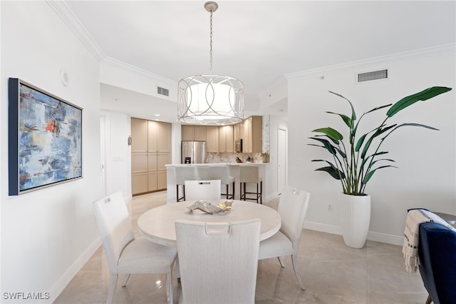 5793 Cape Harbour Dr Unit 1111, Cape Coral, FL 33914 - dining room with light tile patterned floors, ornamental molding, and visible vents