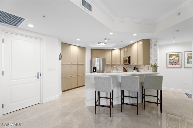 5793 Cape Harbour Dr Unit 1111, Cape Coral, FL 33914 - kitchen with crown molding, appliances with stainless steel finishes, visible vents, and a breakfast bar