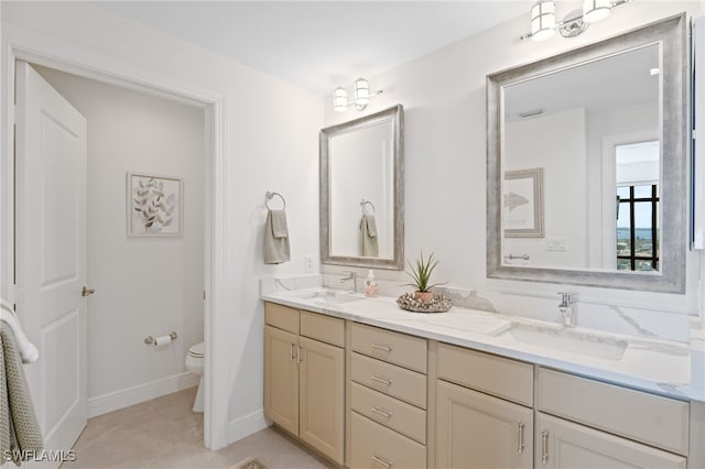 5793 Cape Harbour Dr Unit 1111, Cape Coral, FL 33914 - bathroom featuring double vanity, toilet, tile patterned flooring, and a sink