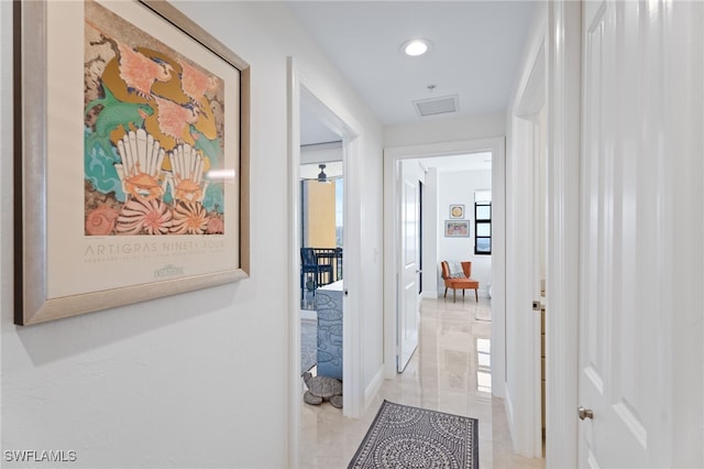 5793 Cape Harbour Dr Unit 1111, Cape Coral, FL 33914 - hallway with baseboards, visible vents, and recessed lighting