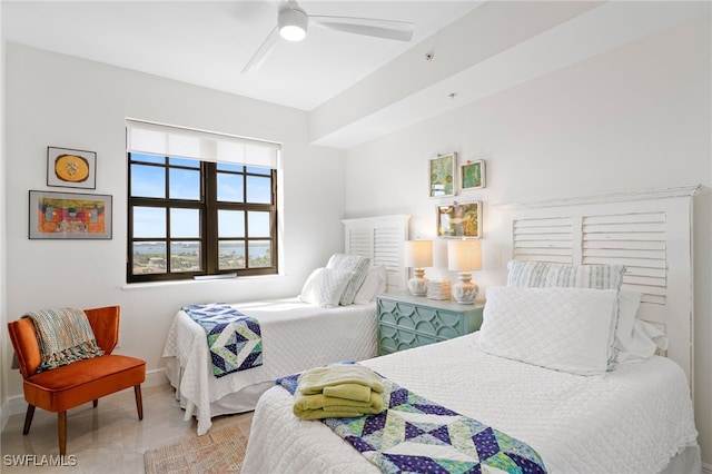 5793 Cape Harbour Dr Unit 1111, Cape Coral, FL 33914 - bedroom featuring baseboards and a ceiling fan