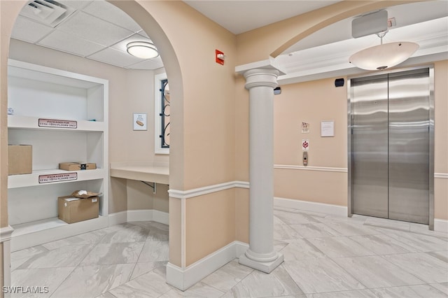 5793 Cape Harbour Dr Unit 1111, Cape Coral, FL 33914 - hall with elevator, marble finish floor, arched walkways, and built in shelves