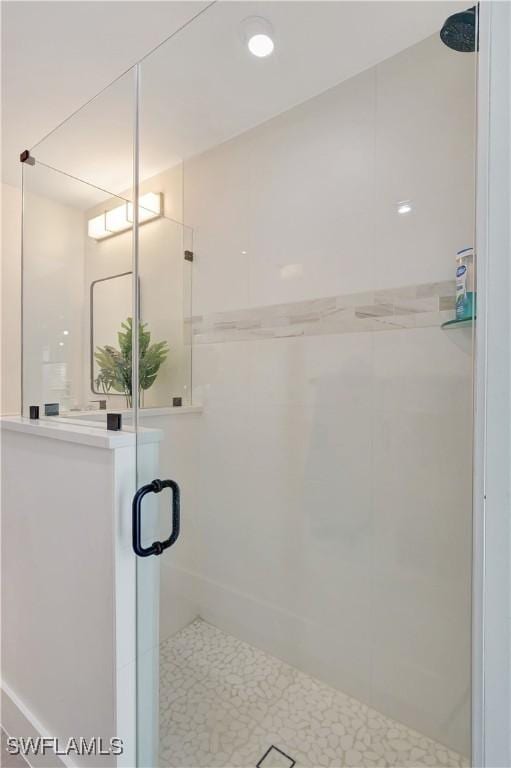 bathroom featuring a stall shower