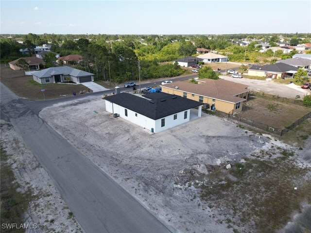 2619 15th St SW, Lehigh Acres, FL 33976 - drone / aerial view featuring a residential view