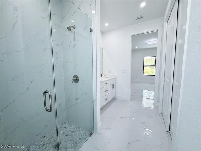 2619 15th St SW, Lehigh Acres, FL 33976 - full bath with vanity, a marble finish shower, marble finish floor, recessed lighting, and visible vents