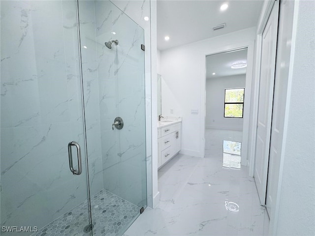 2619 15th St SW, Lehigh Acres, FL 33976 - full bathroom featuring a marble finish shower, recessed lighting, marble finish flooring, and vanity