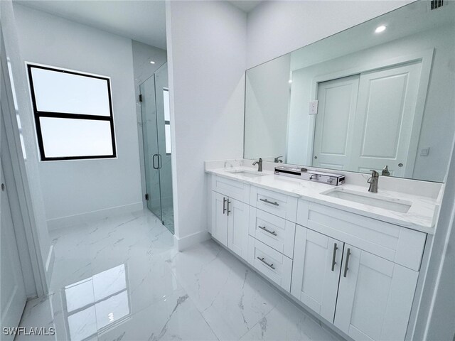 2619 15th St SW, Lehigh Acres, FL 33976 - full bath featuring baseboards, a sink, and marble finish floor