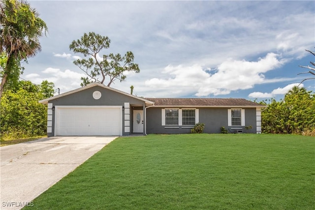 ranch-style house with stucco siding, an attached garage, driveway, and a front lawn