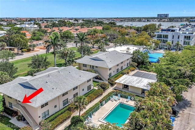 722 Broad Ave S Unit 722, Naples, FL 34102 - drone / aerial view of a pool area and a nearby body of water