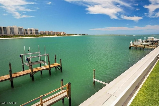 view of dock featuring a water view and boat lift