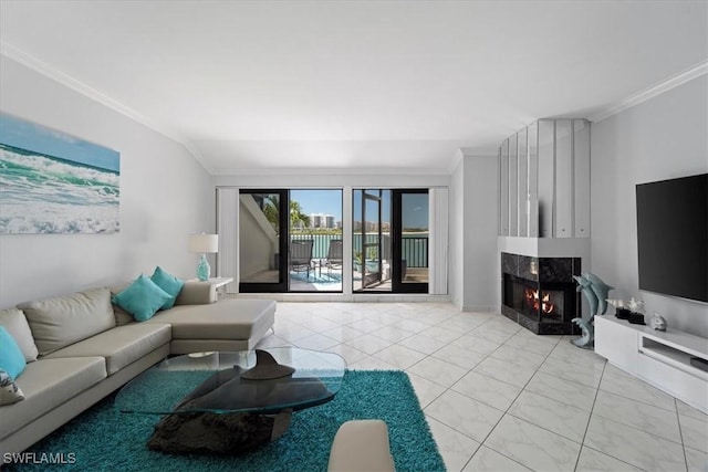 living room featuring crown molding and a premium fireplace