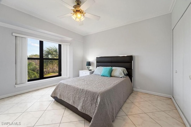 bedroom featuring crown molding, baseboards, ceiling fan, and light tile patterned flooring