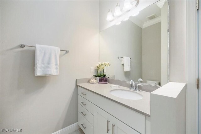 15102 Palmer Lake Cir Unit 201, Naples, FL 34109 - bathroom featuring vanity and toilet