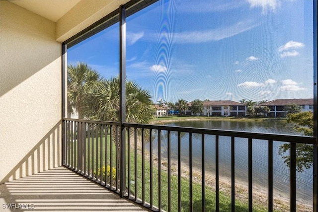 15102 Palmer Lake Cir Unit 201, Naples, FL 34109 - balcony with a water view