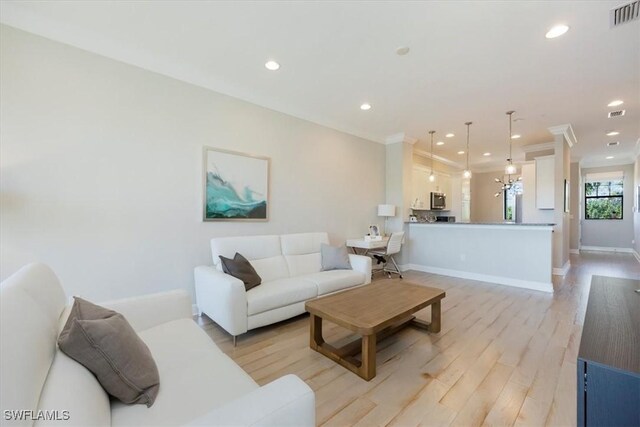 15102 Palmer Lake Cir Unit 201, Naples, FL 34109 - living area featuring recessed lighting, light wood-style floors, and baseboards
