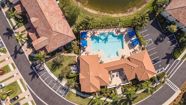 15102 Palmer Lake Cir Unit 201, Naples, FL 34109 - drone / aerial view of a pool