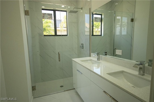 2808 NW 21st Ave, Cape Coral, FL 33993 - bathroom featuring double vanity, a marble finish shower, a sink, and marble finish floor