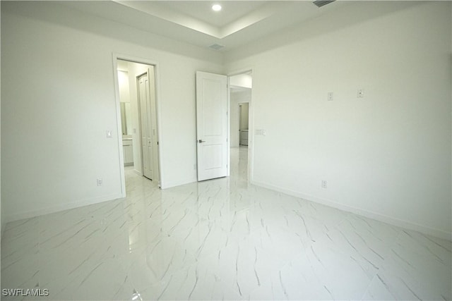 2808 NW 21st Ave, Cape Coral, FL 33993 - unfurnished bedroom with baseboards, recessed lighting, marble finish floor, and ensuite bathroom