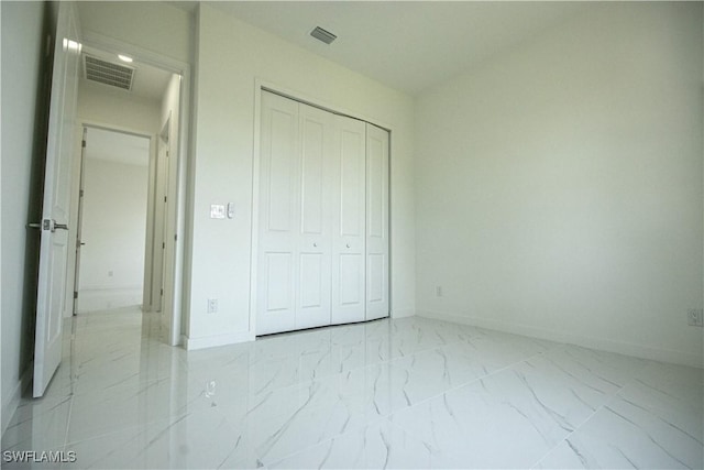 2808 NW 21st Ave, Cape Coral, FL 33993 - unfurnished bedroom featuring visible vents, marble finish floor, and baseboards
