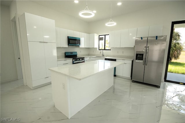 2808 NW 21st Ave, Cape Coral, FL 33993 - kitchen featuring white cabinetry, appliances with stainless steel finishes, a sink, and marble finish floor