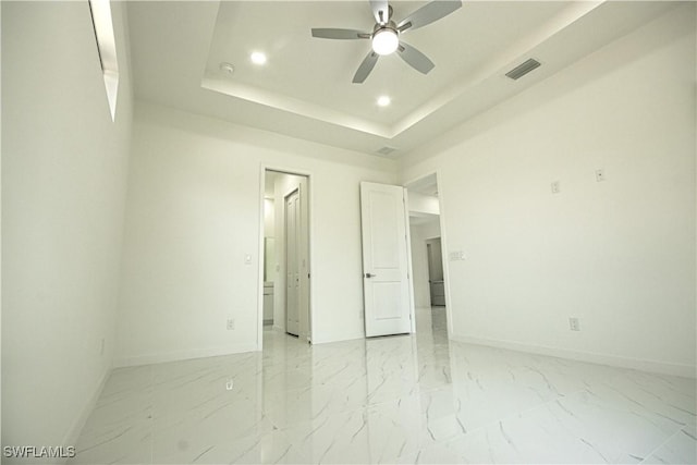 2808 NW 21st Ave, Cape Coral, FL 33993 - unfurnished bedroom featuring visible vents, baseboards, a raised ceiling, marble finish floor, and recessed lighting