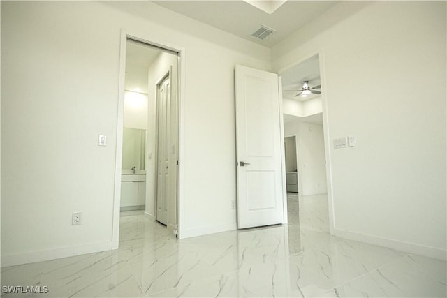 2808 NW 21st Ave, Cape Coral, FL 33993 - unfurnished bedroom with connected bathroom, baseboards, visible vents, and marble finish floor