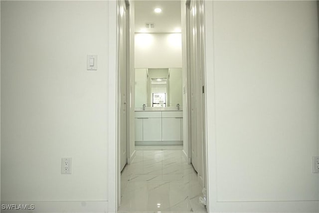 2808 NW 21st Ave, Cape Coral, FL 33993 - corridor with baseboards, recessed lighting, and marble finish floor