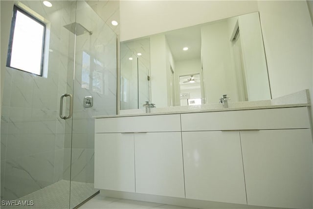 2808 NW 21st Ave, Cape Coral, FL 33993 - bathroom with recessed lighting, double vanity, and a marble finish shower