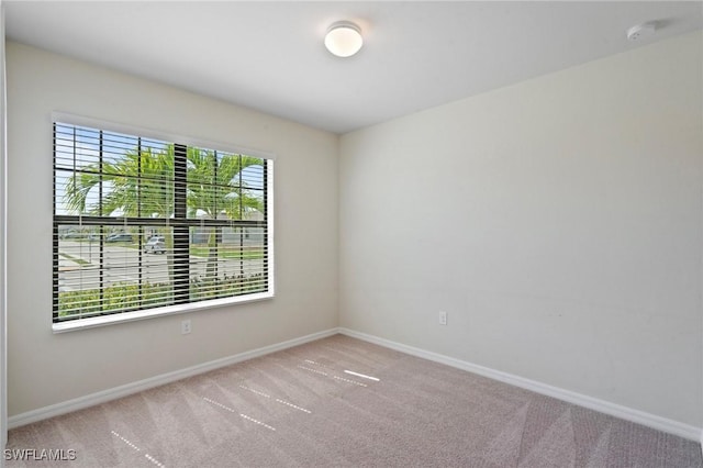 16044 Enclaves Cove Dr, North Fort Myers, FL 33917 - unfurnished room featuring baseboards and carpet flooring