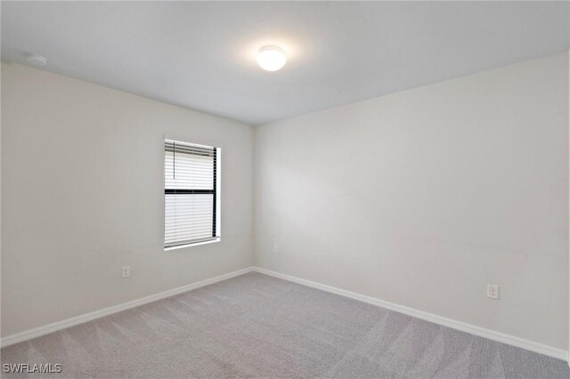 16044 Enclaves Cove Dr, North Fort Myers, FL 33917 - unfurnished room with carpet floors and baseboards