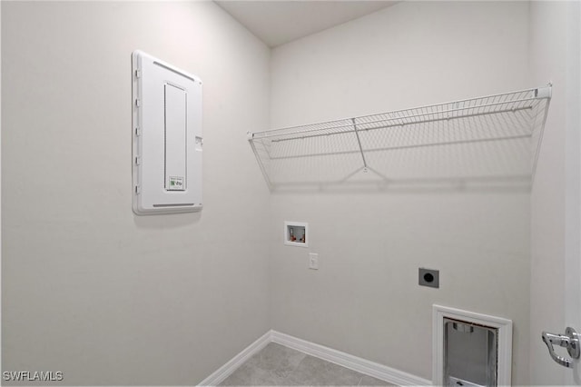 16044 Enclaves Cove Dr, North Fort Myers, FL 33917 - clothes washing area featuring laundry area, baseboards, hookup for a washing machine, electric panel, and electric dryer hookup