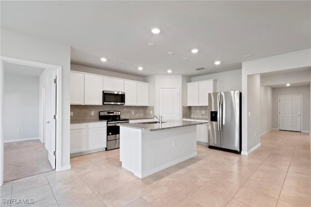 16044 Enclaves Cove Dr, North Fort Myers, FL 33917 - kitchen featuring backsplash, stone countertops, appliances with stainless steel finishes, and a sink